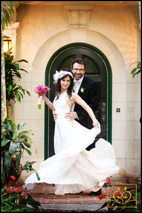 Jackaline & Don in a moving formal portrait in the entry way to Villa Woodbine.