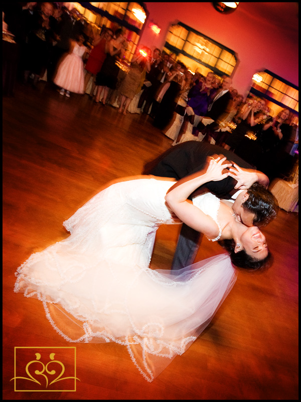 A romantic dip during their first dance.