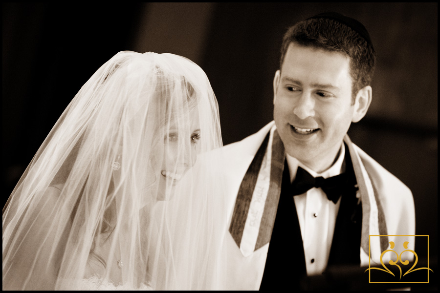 Moments like these are priceless as Rebecca and Eric share a laugh during their ceremony.